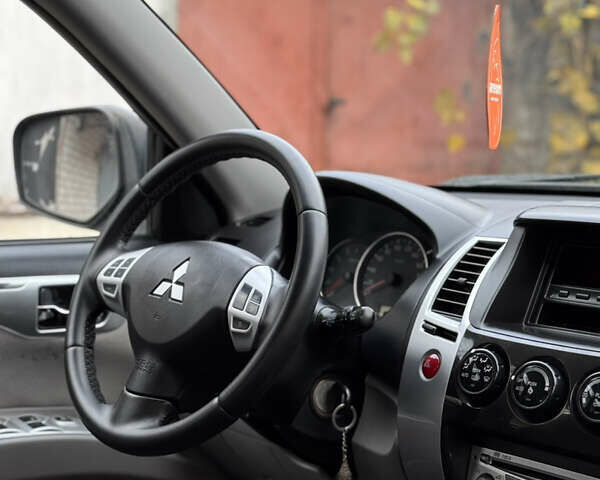 Черный Мицубиси Паджеро Спорт, объемом двигателя 2.5 л и пробегом 219 тыс. км за 12200 $, фото 64 на Automoto.ua