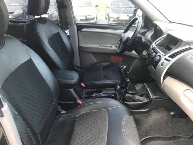 Черный Мицубиси Паджеро Спорт, объемом двигателя 2.5 л и пробегом 296 тыс. км за 11690 $, фото 9 на Automoto.ua