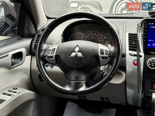 Черный Мицубиси Паджеро Спорт, объемом двигателя 2.5 л и пробегом 190 тыс. км за 14500 $, фото 14 на Automoto.ua