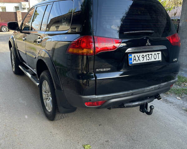 Черный Мицубиси Паджеро Спорт, объемом двигателя 2.5 л и пробегом 169 тыс. км за 15200 $, фото 5 на Automoto.ua