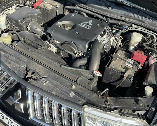 Черный Мицубиси Паджеро Спорт, объемом двигателя 2.5 л и пробегом 169 тыс. км за 15200 $, фото 14 на Automoto.ua