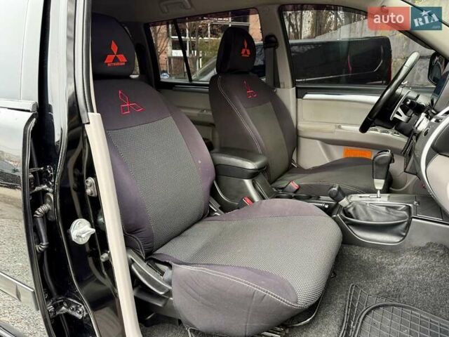 Черный Мицубиси Паджеро Спорт, объемом двигателя 2.5 л и пробегом 190 тыс. км за 14500 $, фото 10 на Automoto.ua