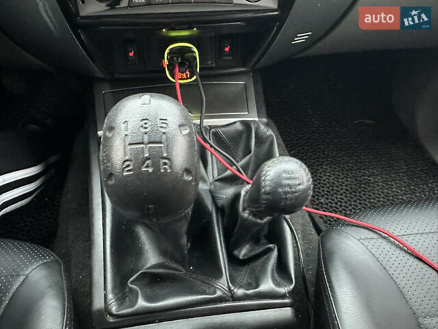 Черный Мицубиси Паджеро Спорт, объемом двигателя 2.5 л и пробегом 295 тыс. км за 13200 $, фото 40 на Automoto.ua