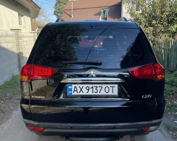 Черный Мицубиси Паджеро Спорт, объемом двигателя 2.5 л и пробегом 169 тыс. км за 15200 $, фото 4 на Automoto.ua