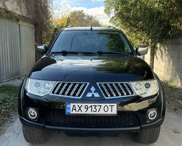 Черный Мицубиси Паджеро Спорт, объемом двигателя 2.5 л и пробегом 169 тыс. км за 15200 $, фото 1 на Automoto.ua