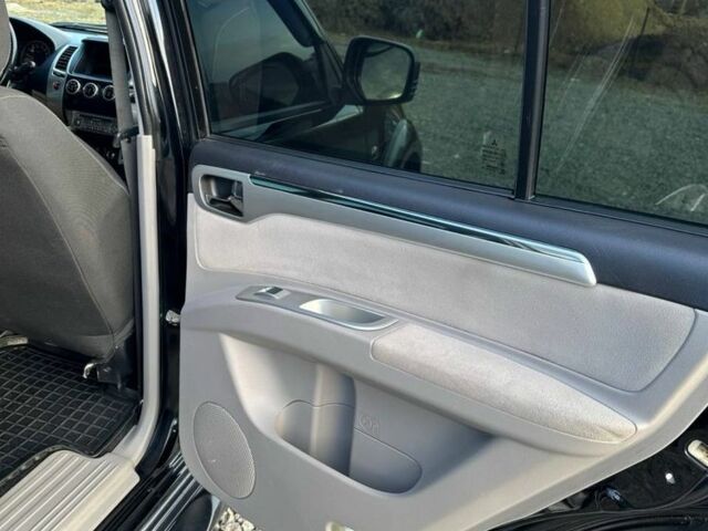 Черный Мицубиси Паджеро Спорт, объемом двигателя 2.5 л и пробегом 139 тыс. км за 15000 $, фото 11 на Automoto.ua