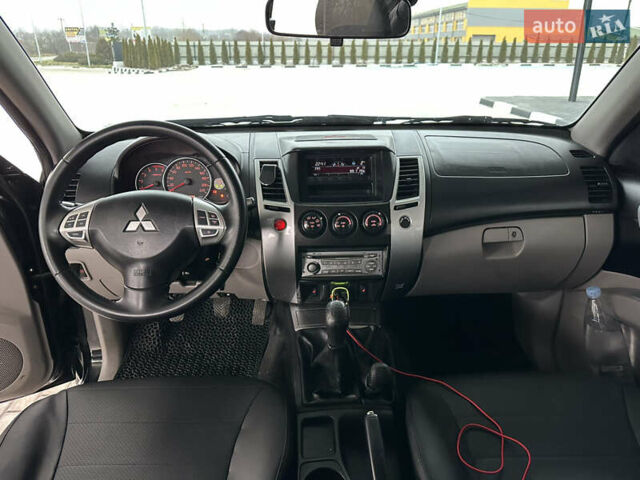Черный Мицубиси Паджеро Спорт, объемом двигателя 2.5 л и пробегом 295 тыс. км за 13200 $, фото 36 на Automoto.ua