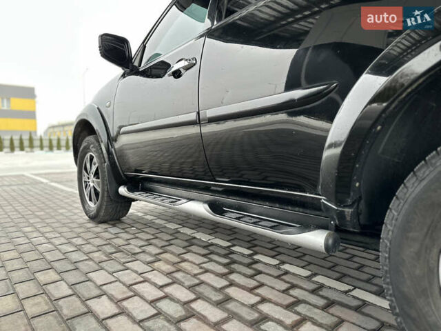 Черный Мицубиси Паджеро Спорт, объемом двигателя 2.5 л и пробегом 295 тыс. км за 13200 $, фото 27 на Automoto.ua