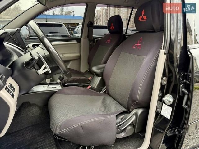 Черный Мицубиси Паджеро Спорт, объемом двигателя 2.5 л и пробегом 190 тыс. км за 14500 $, фото 7 на Automoto.ua