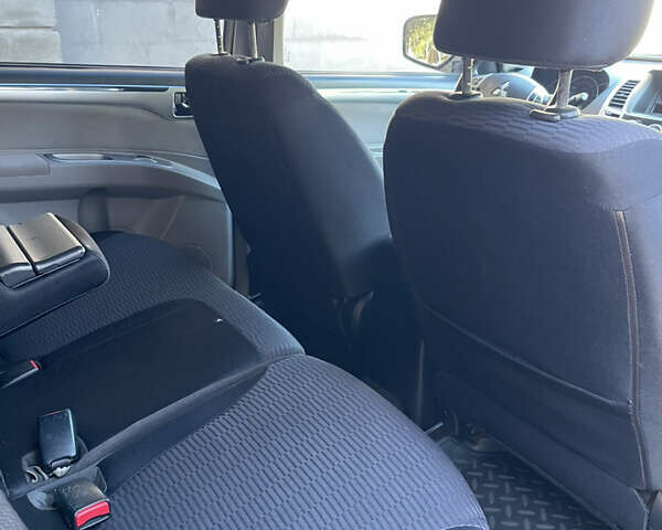 Черный Мицубиси Паджеро Спорт, объемом двигателя 2.5 л и пробегом 169 тыс. км за 15200 $, фото 9 на Automoto.ua