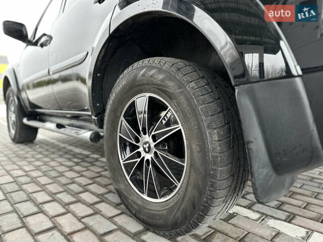 Черный Мицубиси Паджеро Спорт, объемом двигателя 2.5 л и пробегом 295 тыс. км за 13200 $, фото 26 на Automoto.ua