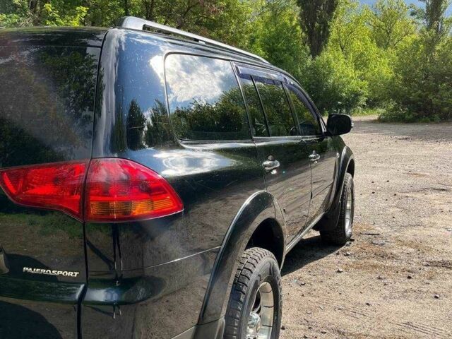 Чорний Міцубісі Паджеро Спорт, об'ємом двигуна 2.5 л та пробігом 150 тис. км за 16700 $, фото 6 на Automoto.ua