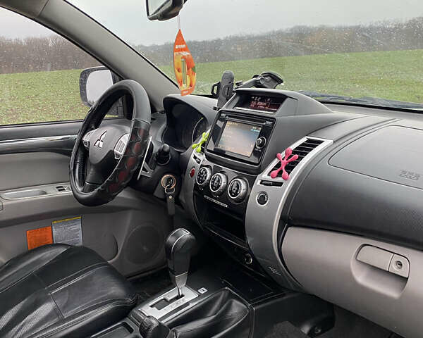 Черный Мицубиси Паджеро Спорт, объемом двигателя 2.5 л и пробегом 230 тыс. км за 14800 $, фото 18 на Automoto.ua