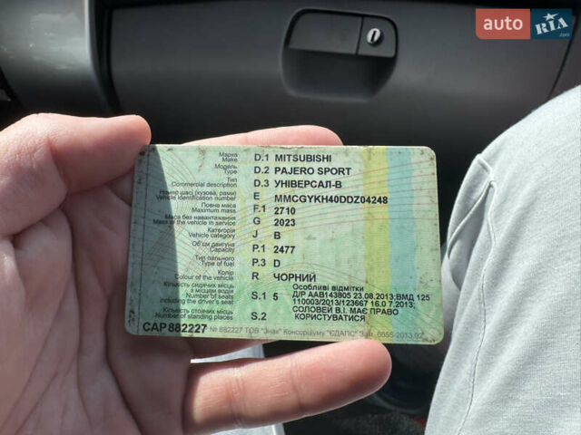 Чорний Міцубісі Паджеро Спорт, об'ємом двигуна 2.48 л та пробігом 258 тис. км за 13900 $, фото 14 на Automoto.ua