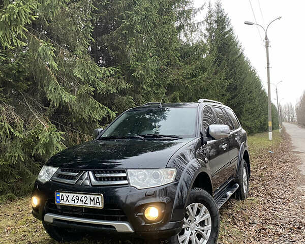 Черный Мицубиси Паджеро Спорт, объемом двигателя 2.5 л и пробегом 230 тыс. км за 14800 $, фото 4 на Automoto.ua