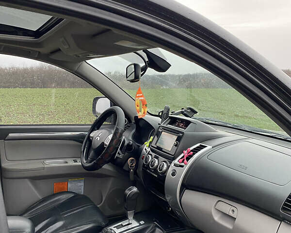 Черный Мицубиси Паджеро Спорт, объемом двигателя 2.5 л и пробегом 230 тыс. км за 14800 $, фото 16 на Automoto.ua