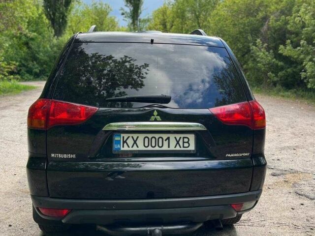 Чорний Міцубісі Паджеро Спорт, об'ємом двигуна 2.5 л та пробігом 150 тис. км за 16700 $, фото 4 на Automoto.ua