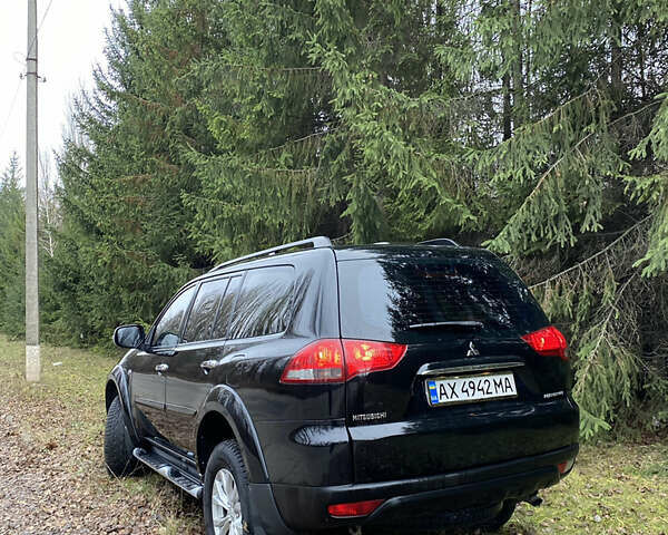 Черный Мицубиси Паджеро Спорт, объемом двигателя 2.5 л и пробегом 230 тыс. км за 14800 $, фото 7 на Automoto.ua
