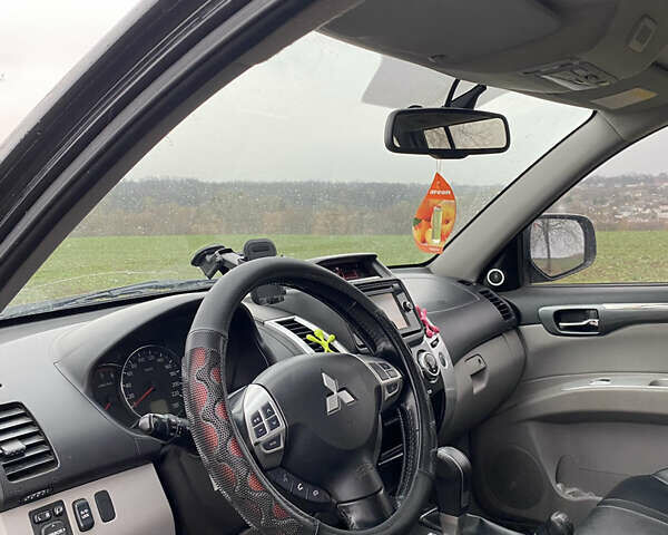 Черный Мицубиси Паджеро Спорт, объемом двигателя 2.5 л и пробегом 230 тыс. км за 14800 $, фото 21 на Automoto.ua