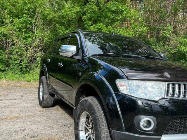 Чорний Міцубісі Паджеро Спорт, об'ємом двигуна 2.5 л та пробігом 150 тис. км за 16700 $, фото 9 на Automoto.ua