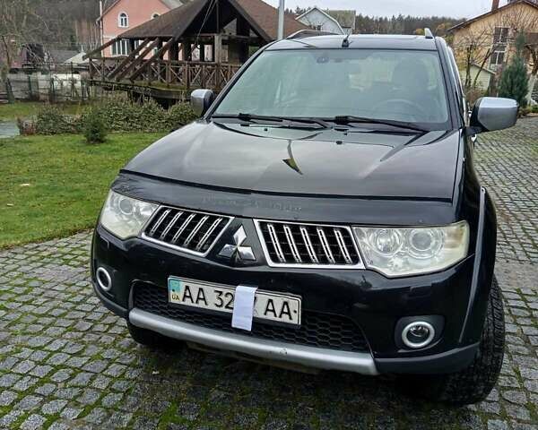 Чорний Міцубісі Паджеро Спорт, об'ємом двигуна 2.48 л та пробігом 300 тис. км за 15500 $, фото 14 на Automoto.ua