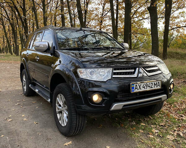 Черный Мицубиси Паджеро Спорт, объемом двигателя 2.5 л и пробегом 230 тыс. км за 14800 $, фото 2 на Automoto.ua