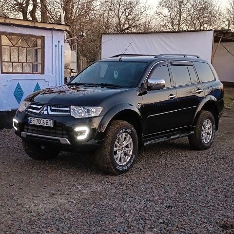 Черный Мицубиси Паджеро Спорт, объемом двигателя 2.5 л и пробегом 147 тыс. км за 15700 $, фото 2 на Automoto.ua