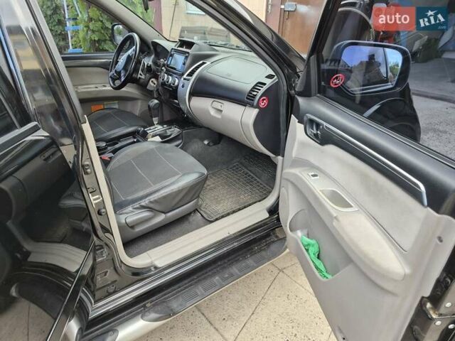 Чорний Міцубісі Паджеро Спорт, об'ємом двигуна 2.48 л та пробігом 192 тис. км за 16300 $, фото 18 на Automoto.ua
