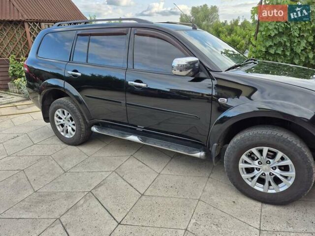 Чорний Міцубісі Паджеро Спорт, об'ємом двигуна 2.48 л та пробігом 192 тис. км за 16300 $, фото 2 на Automoto.ua