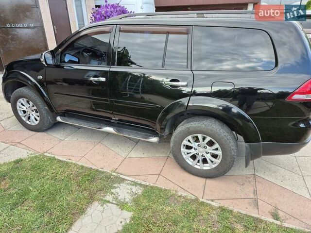 Чорний Міцубісі Паджеро Спорт, об'ємом двигуна 2.48 л та пробігом 192 тис. км за 16300 $, фото 10 на Automoto.ua