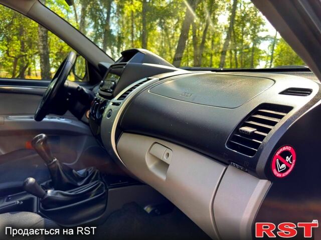 Чорний Міцубісі Паджеро Спорт, об'ємом двигуна 2.5 л та пробігом 181 тис. км за 13300 $, фото 11 на Automoto.ua