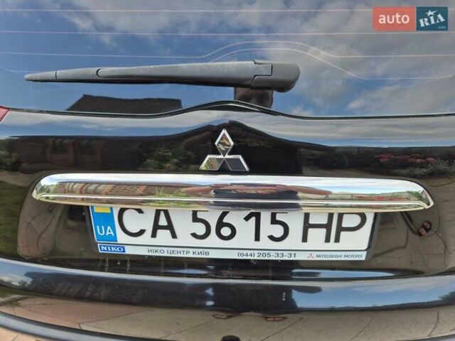 Чорний Міцубісі Паджеро Спорт, об'ємом двигуна 2.48 л та пробігом 192 тис. км за 16300 $, фото 7 на Automoto.ua