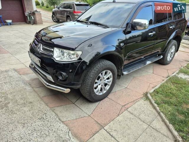 Чорний Міцубісі Паджеро Спорт, об'ємом двигуна 2.48 л та пробігом 192 тис. км за 16300 $, фото 11 на Automoto.ua