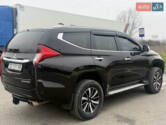 Черный Мицубиси Паджеро Спорт, объемом двигателя 2.44 л и пробегом 135 тыс. км за 22500 $, фото 4 на Automoto.ua