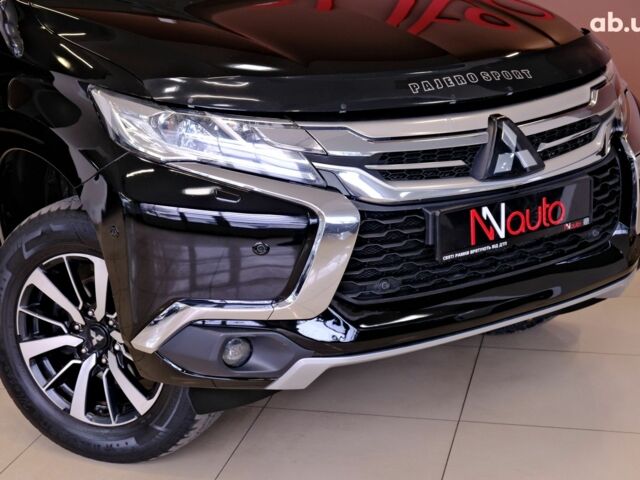 Черный Мицубиси Паджеро Спорт, объемом двигателя 2.4 л и пробегом 182 тыс. км за 19900 $, фото 2 на Automoto.ua