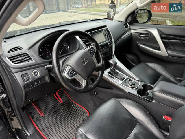 Черный Мицубиси Паджеро Спорт, объемом двигателя 2.44 л и пробегом 119 тыс. км за 19999 $, фото 40 на Automoto.ua