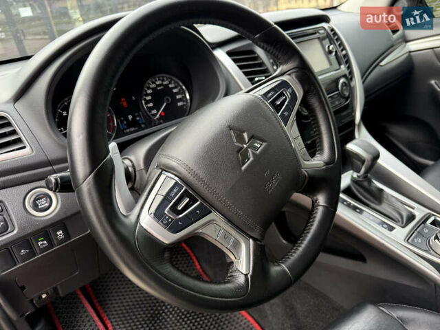 Черный Мицубиси Паджеро Спорт, объемом двигателя 2.44 л и пробегом 119 тыс. км за 19999 $, фото 44 на Automoto.ua