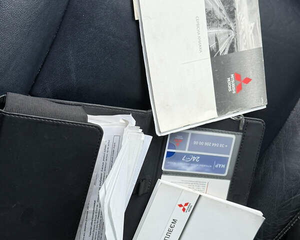 Черный Мицубиси Паджеро Спорт, объемом двигателя 2.44 л и пробегом 119 тыс. км за 19999 $, фото 4 на Automoto.ua