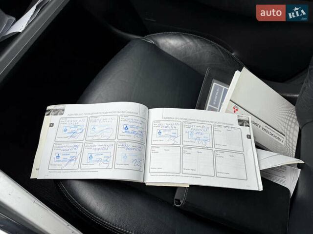 Черный Мицубиси Паджеро Спорт, объемом двигателя 2.44 л и пробегом 119 тыс. км за 19999 $, фото 3 на Automoto.ua