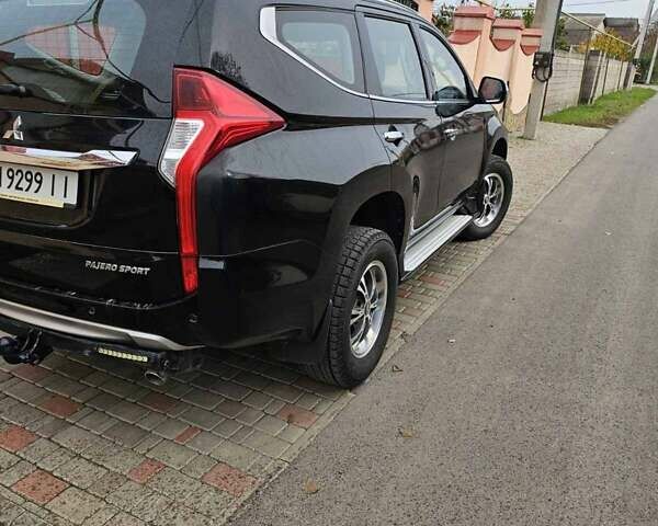 Чорний Міцубісі Паджеро Спорт, об'ємом двигуна 2.44 л та пробігом 96 тис. км за 21000 $, фото 4 на Automoto.ua