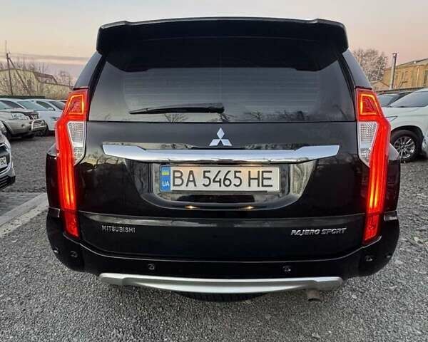Чорний Міцубісі Паджеро Спорт, об'ємом двигуна 2.5 л та пробігом 105 тис. км за 23000 $, фото 9 на Automoto.ua