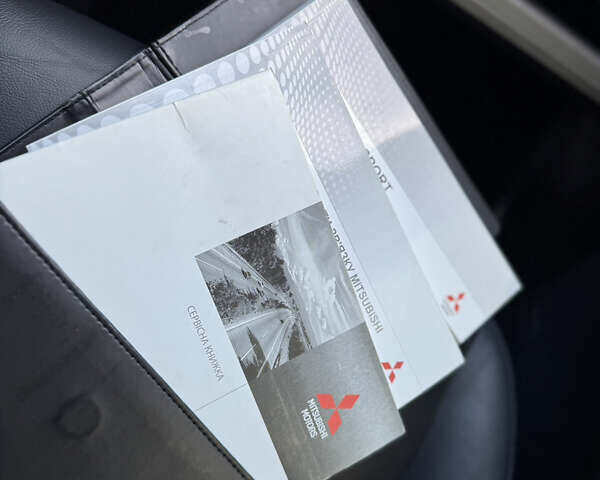 Черный Мицубиси Паджеро Спорт, объемом двигателя 2.44 л и пробегом 235 тыс. км за 22900 $, фото 26 на Automoto.ua