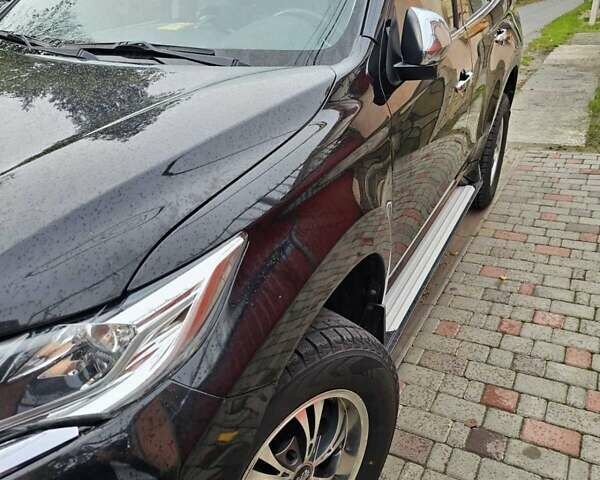 Чорний Міцубісі Паджеро Спорт, об'ємом двигуна 2.44 л та пробігом 96 тис. км за 21000 $, фото 1 на Automoto.ua