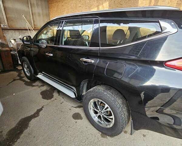 Чорний Міцубісі Паджеро Спорт, об'ємом двигуна 2.44 л та пробігом 96 тис. км за 21000 $, фото 3 на Automoto.ua