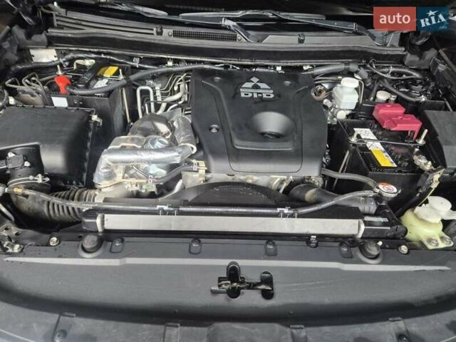 Чорний Міцубісі Паджеро Спорт, об'ємом двигуна 2.44 л та пробігом 79 тис. км за 22000 $, фото 16 на Automoto.ua