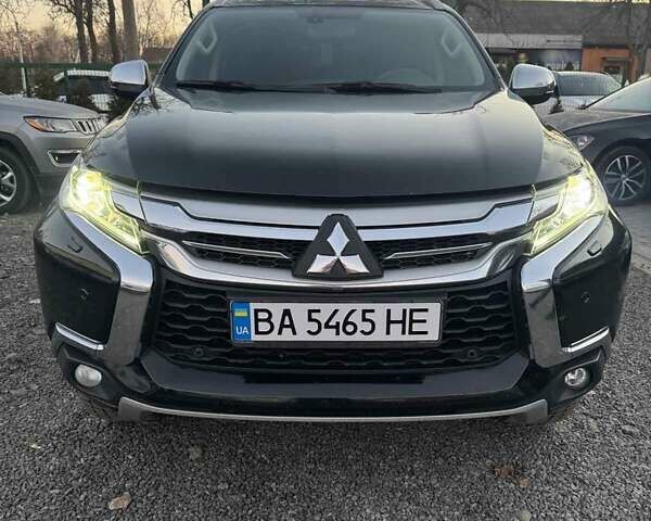 Чорний Міцубісі Паджеро Спорт, об'ємом двигуна 2.5 л та пробігом 105 тис. км за 23000 $, фото 4 на Automoto.ua