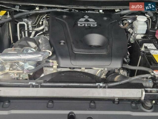 Чорний Міцубісі Паджеро Спорт, об'ємом двигуна 2.44 л та пробігом 79 тис. км за 22000 $, фото 11 на Automoto.ua