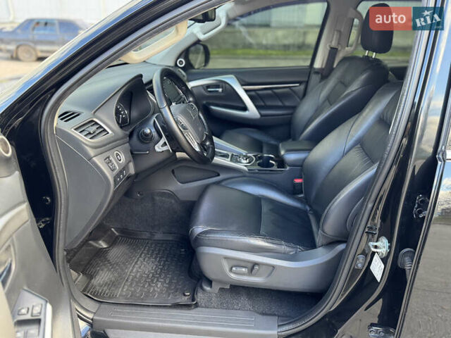 Черный Мицубиси Паджеро Спорт, объемом двигателя 2.44 л и пробегом 235 тыс. км за 22900 $, фото 17 на Automoto.ua