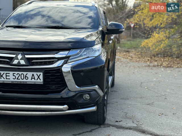 Черный Мицубиси Паджеро Спорт, объемом двигателя 2.44 л и пробегом 235 тыс. км за 22900 $, фото 4 на Automoto.ua
