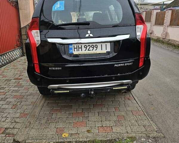 Чорний Міцубісі Паджеро Спорт, об'ємом двигуна 2.44 л та пробігом 96 тис. км за 21000 $, фото 6 на Automoto.ua